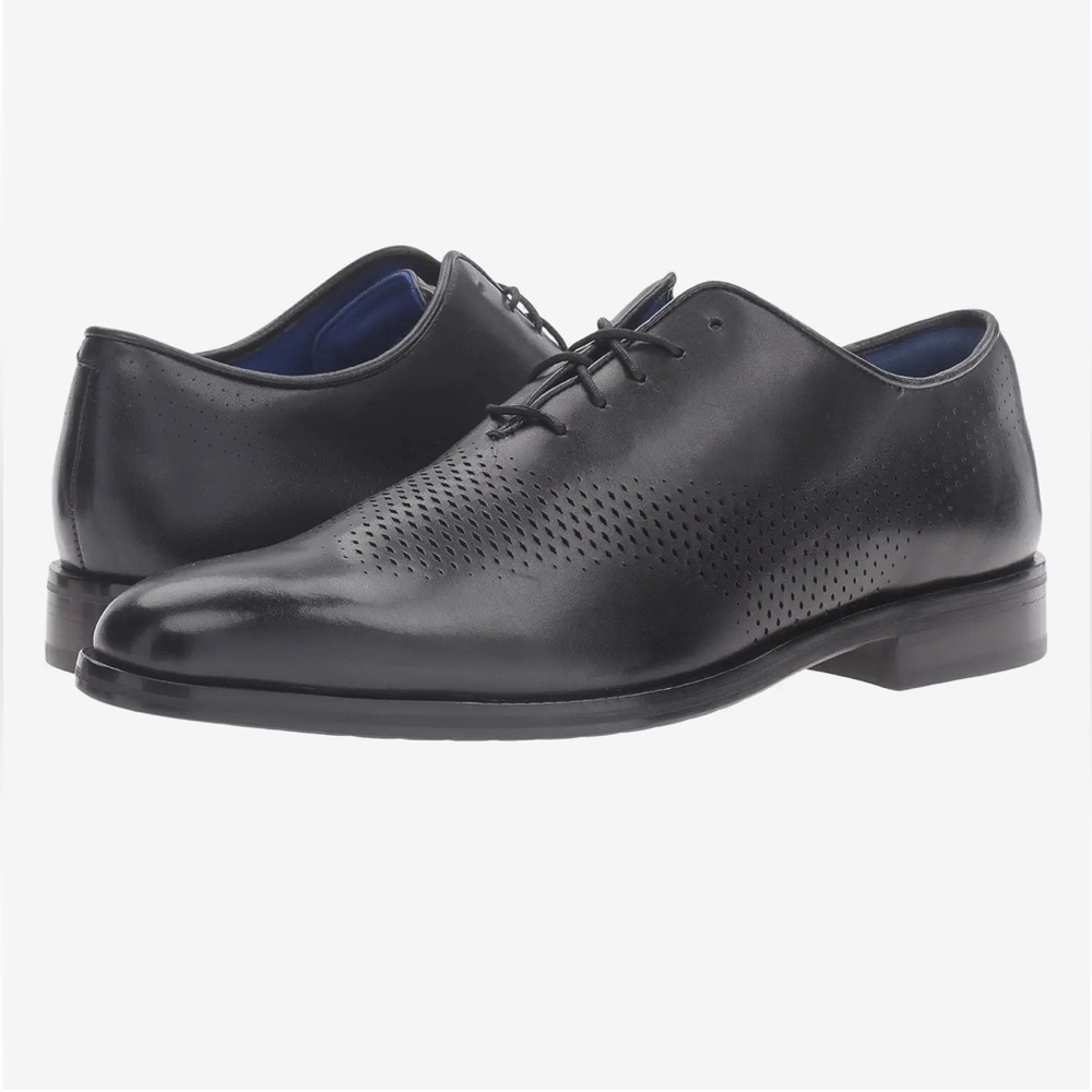 Cole Haan Washington Grand Laser Wing men’s Oxfords in black with blue interior